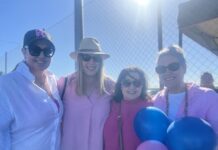Supporters cheer on teams