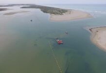 Dredging begins as Mouth silts up